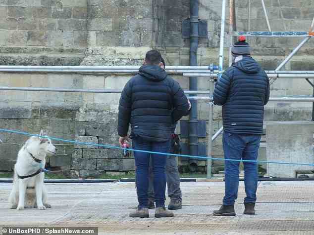 Staff: Crew members were seen outside wearing padded jackets with dogs