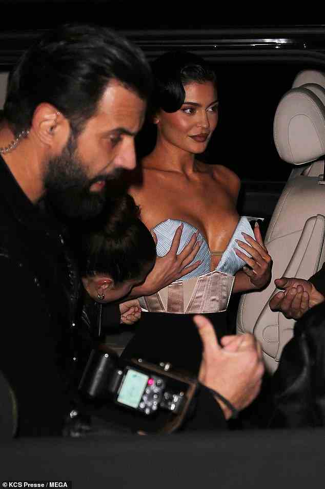 Good look: Kylie looked very glamorous as she was photographed while arriving at the event