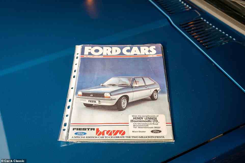 The auction lot even includes the original brochure sold with the car by a Bournemouth Ford dealership in 1981