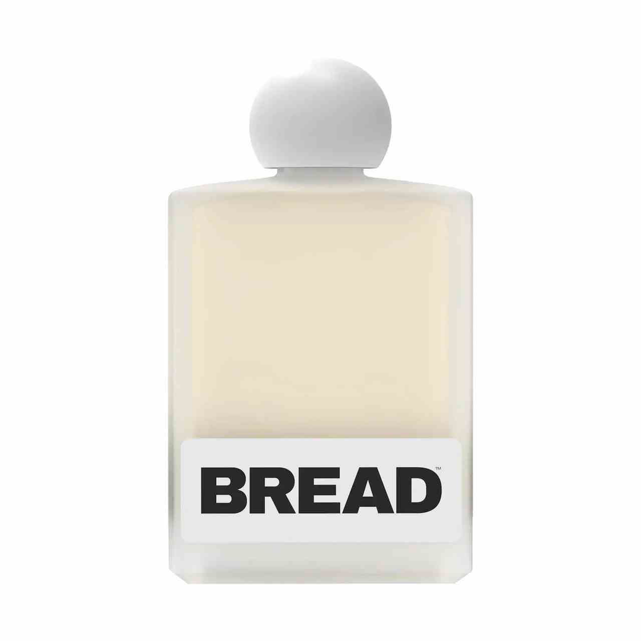 Brot Beauty Supply Macadamiaöl Quadratische Flasche hellgelbes Öl mit weißer Kugelkappe auf weißem Hintergrund