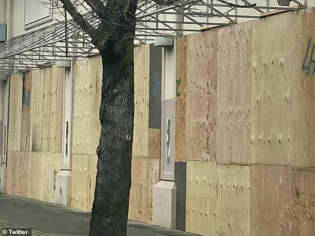 Businesses in multiple cities have been boarded up in anticipation for the release of the shocking footage