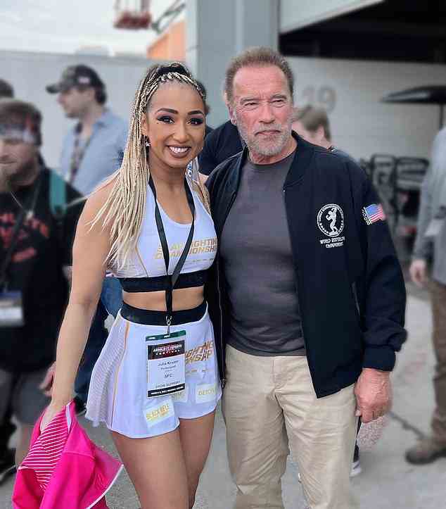 Arnold Schwarzenegger has helped to legitimise the sport with his own endorsement. Pictured with competitor Julia Kruz
