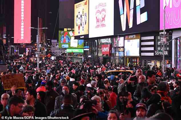 Hundreds gathered during the protest in the heart of Times Square on Saturday night