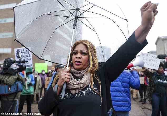 Towanna Murphy holds up her fist during a march for Tyre Nichols, who died after being beaten by Memphis police during a traffic stop, in Memphis, on Saturday