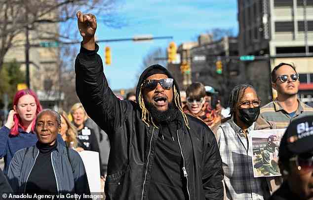 People gather to protest against the police violence following the killing of Tyree Nichols in Charlotte North Carolina