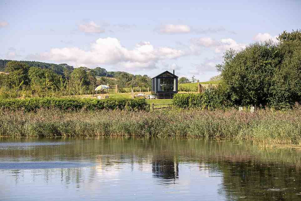 The look of luxury: Check into one of three huts overlooking a lake in Dorset's Lower Ansty, with allerdorset.com