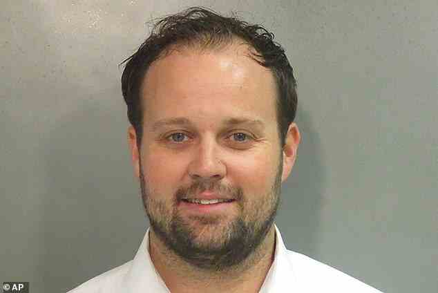 Josh Duggar was sentenced to 12 years and seven months behind bars (pictured in his December 2021 booking photo)