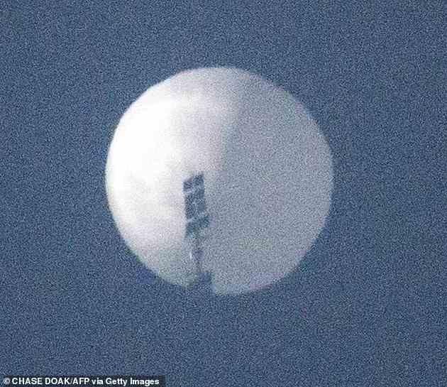 A US defense official said the balloon is the size of several buses - but doesn't pose an immediate threat to Americans. The balloon, pictured over Montana, has been tracked for several days but officials decided not to shoot it down over fears about debris. China claims it is a civilian airship used for meteorological research
