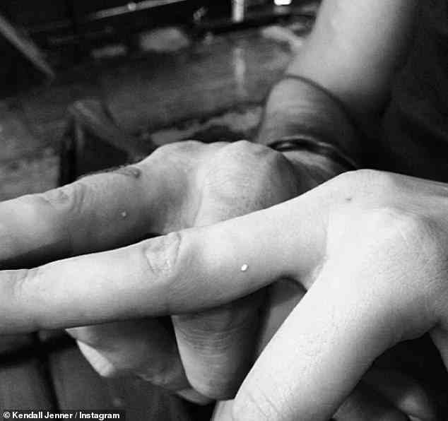 Dainty: One June day in 2015, tattoo artist JonBoy gave Kendall her first tattoo - a white dot on her middle finger