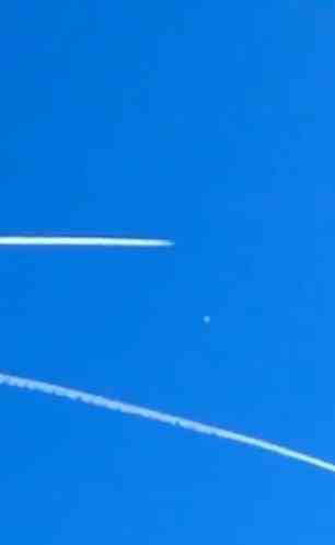 Trails from jets around the Chinese balloon