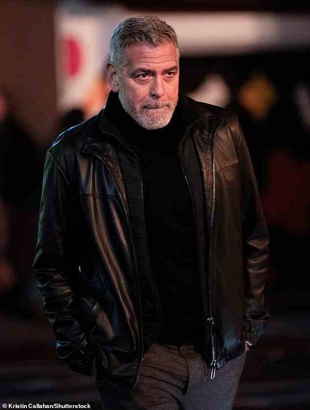 In the zone: Clooney also wore a black leather jacket for his role as the Hollywood heavyweights came together for the new movie