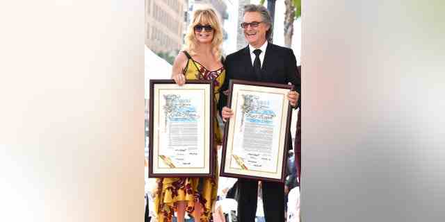 Goldie Hawn and Kurt Russell celebrate side-by-side stars at Hollywood Walk of Fame ceremony.