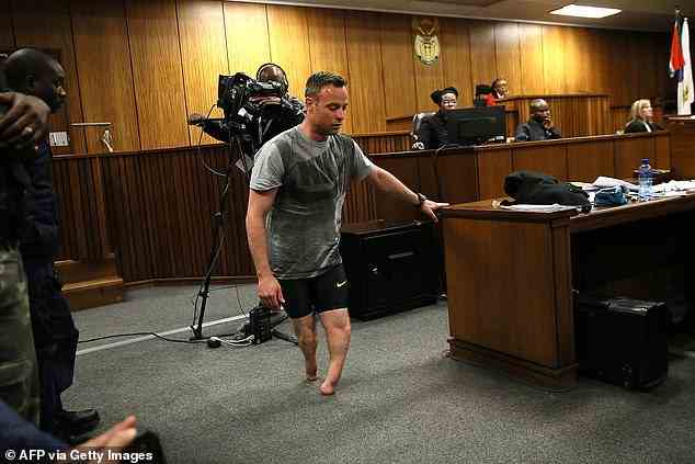 Oscar Pistorius walks in the courtroom without his prosthetic legs during his resentencing hearing for the 2013 murder of girlfriend Reeva Steenkamp at the Pretoria High Court on June 15, 2016