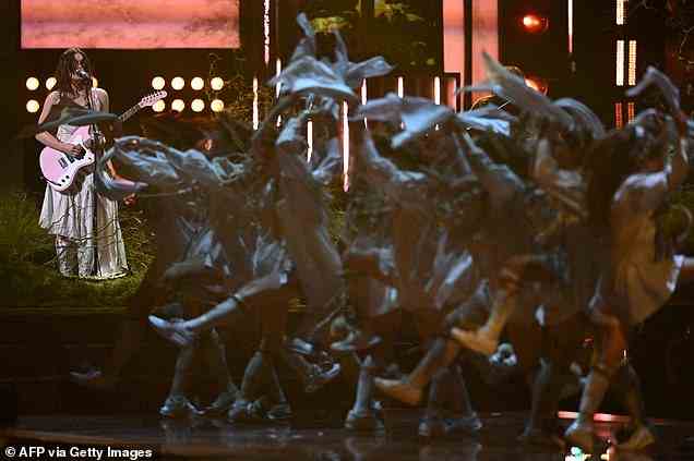 Bizarre: Duo Rhian Teasdale and Hester Chambers looked sensational on stage as they were surrounded by dancers, with some wearing horse heads and holding up signs