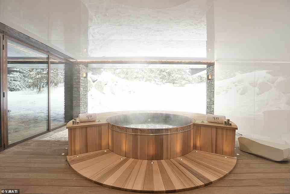 The hotel's spa features this outrageously inviting hot tub, positioned by the piste
