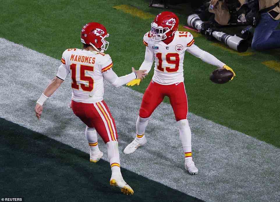 Toney celebrates with Chiefs quarterback Mahomes after catching a five-yard touchdown pass from his teammate