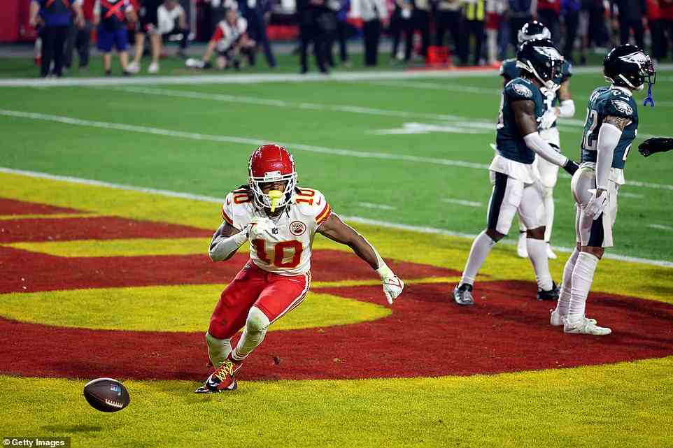 Isiah Pacheco (No. 10) of the Chiefs goes to celebrate his third-quarter touchdown with Jerick McKinnon (not pictured)