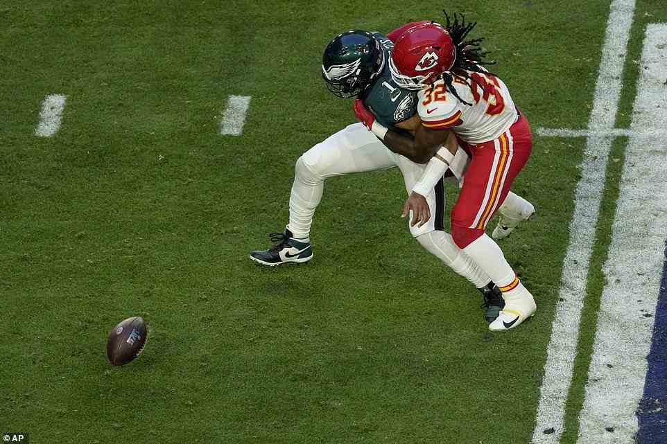 Chiefs linebacker Nick Bolton (32) forces Hurts (1) to fumble after the Eagles quarterback impressed in the early stages