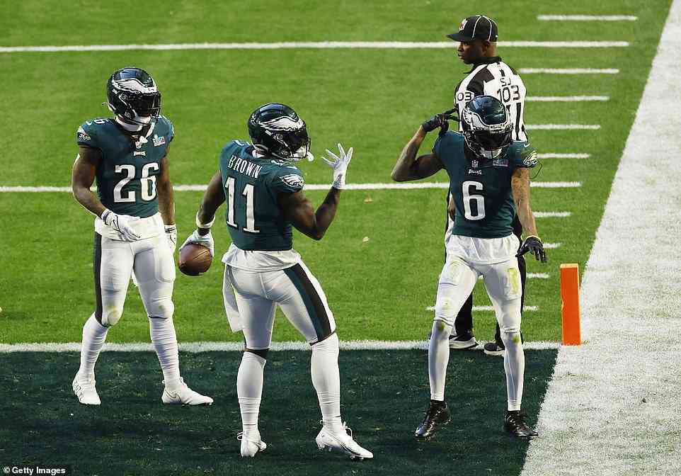 A.J. Brown celebrates in the end zone after putting the Eagles ahead in the first half of Super Bowl LVII on Sunday evening