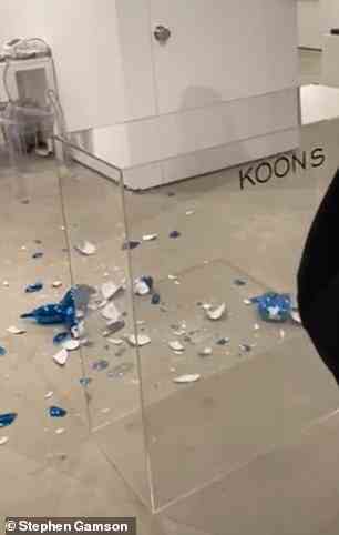 A $42,000 limited edition blue porcelain balloon dog sculpture by world-famous artist Jeff Koons has been smashed by an art collector in downtown Miami