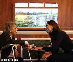 The royal mother-of-three leaned forward as she chatted with one resident during her visit in Slough earlier