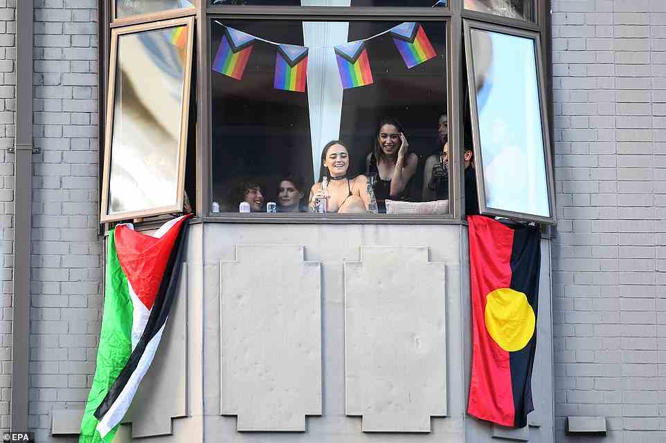 One apartment hung Palestine and Aboriginal flags up - as well as a banner of the Progress flag - in delight