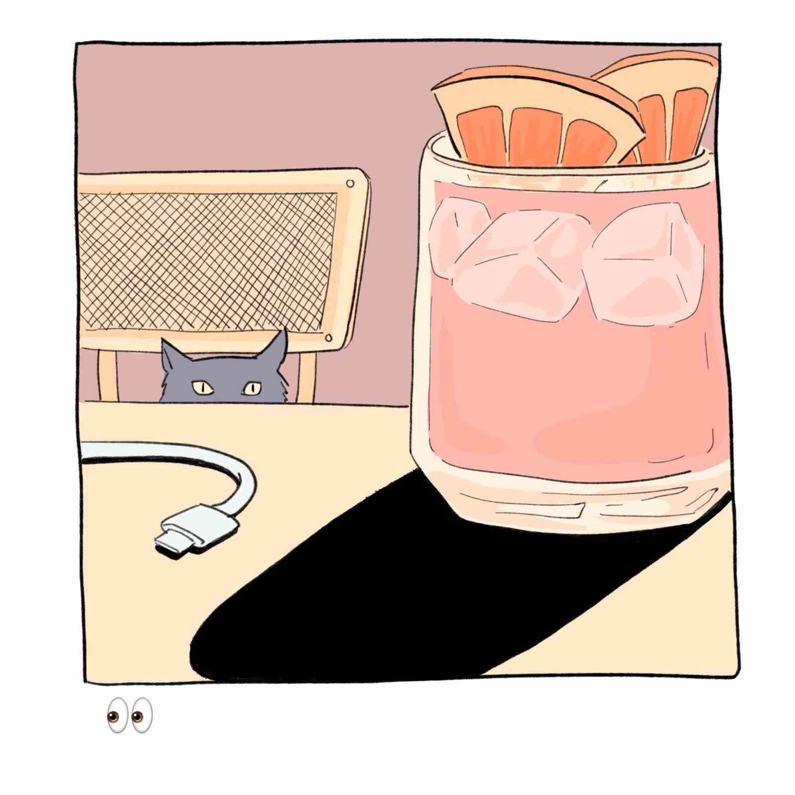 Cocktail im Vordergrund und Katze, die im Hintergrund über den Tisch blickt.