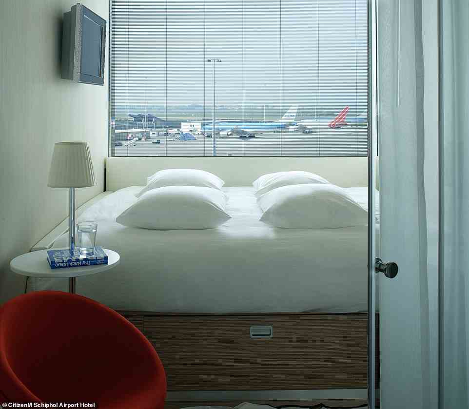 Watch planes take off through the soundproof windows of your room while resting your head on what are said to be the ‘world's fluffiest pillows' at Amsterdam's CitizenM Schiphol Airport Hotel