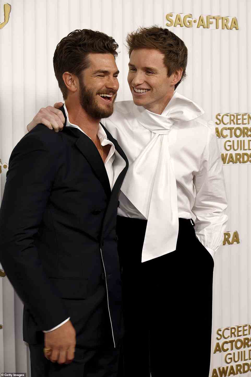 Pals! Andrew Garfield and Eddie Redmayne shared a laugh on the red carpet together