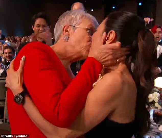 Bond: Jamie Lee Curtis was elated and kissed co-star Michelle Yeoh on the lips as she won at the 29th Screen Actors Guild Awards