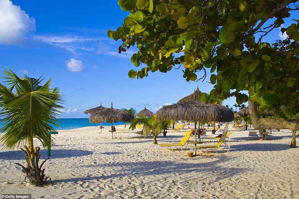 Eagle Beach in Aruba - praised by one visitor for its ‘clear turquoise waters and white sands’ - claims the global silver medal