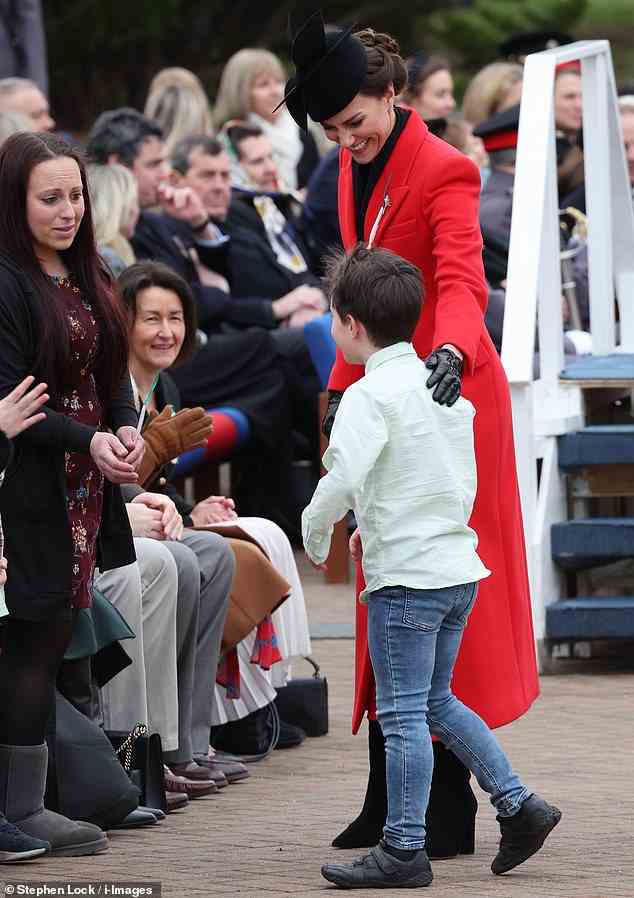The royal mother-of-three, who is known for her kind nature with children, placed a supportive hand on his back as he returned to his seat