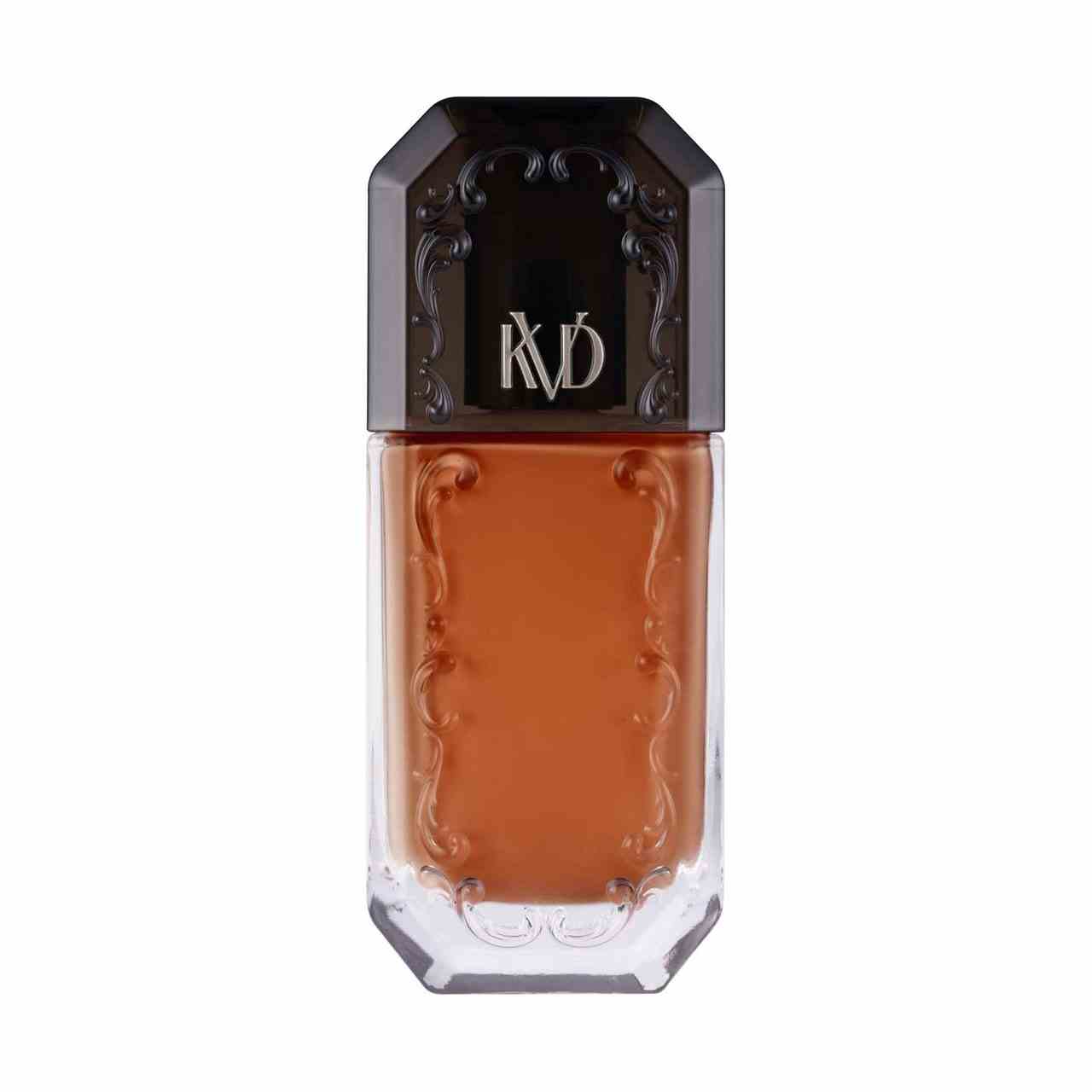 KVD Beauty Good Apple Serum Foundation Flasche Foundation mit gotischem Carving-Design und schwarzer Kappe auf weißem Hintergrund