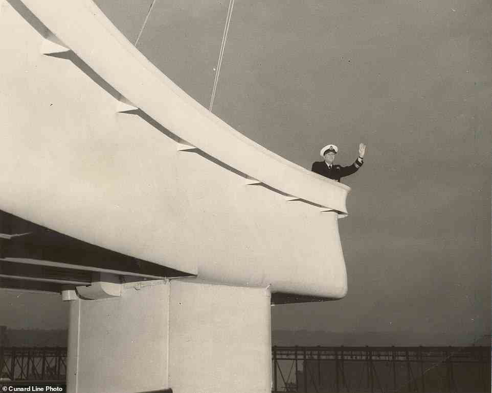 Pictured is Commodore Sir Ivan Thompson waving from the wing of the bridge of Cunard's Queen Elizabeth in 1964