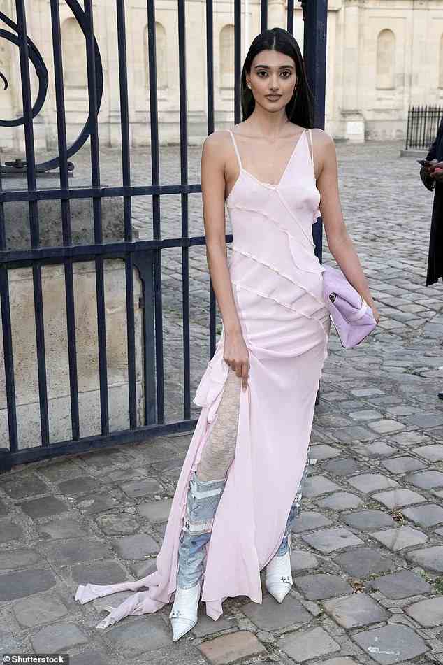 Making a statement: Neelam Gill rocked a ruffle pink dress with quirky white and denim boots