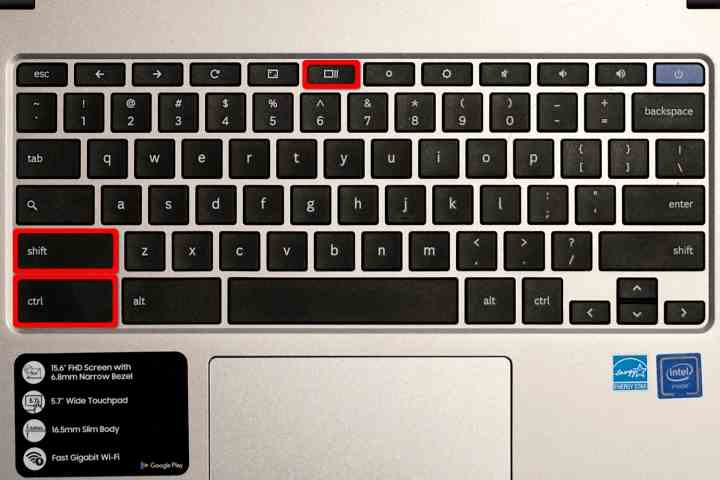 Eine Chromebook-Tastatur mit drei rot hervorgehobenen Tasten.