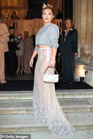 Standing out from the crowd: Florence made sure all eyes were on her in the sheer skirt as she made her entrance