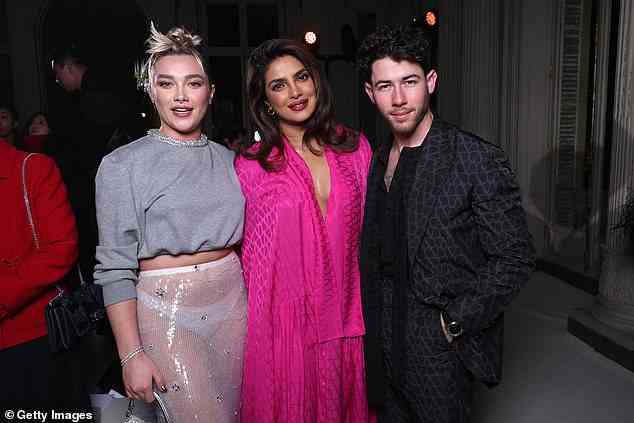 Trio: Actress Florence also posed with Priyanka and Nick once inside the show venue