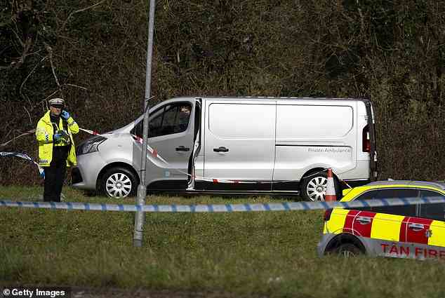 A private ambulance at the scene of an accident on the A48 to carry away the dead