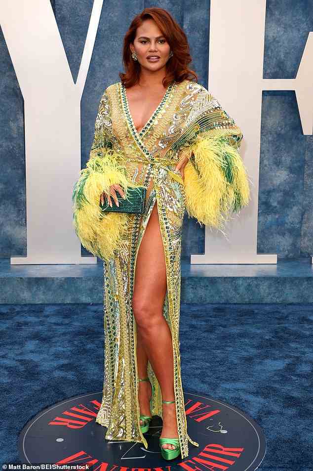 Meanwhile Chrissy Teigen opted for an eye-catching gown that contained hues of vibrant yellow and green for the event
