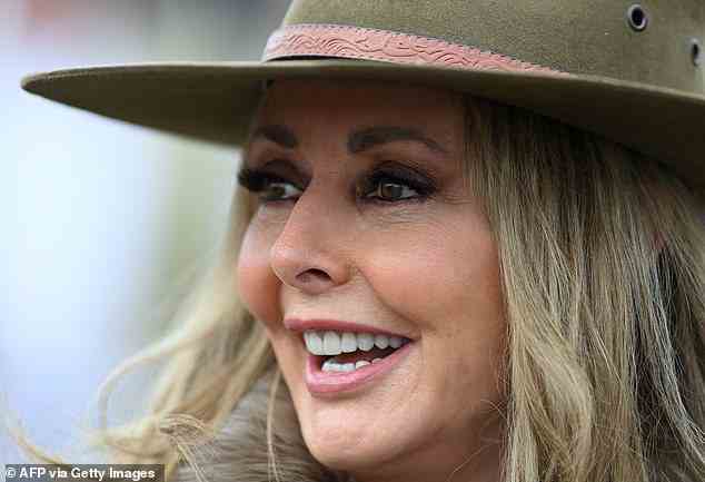 Carol Voderman opted for a brown smoky eye and khaki fedora for Cheltenham Ladies Day today