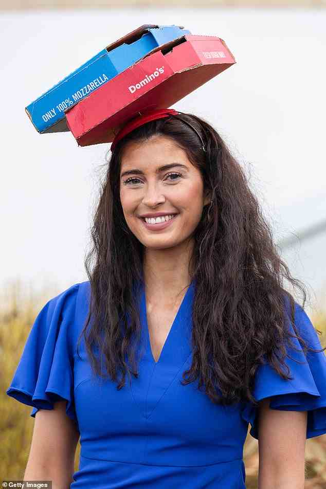 Taking the casual dress code to new extremes, one racegoer wore a fascinator made out of two Domino's Pizza boxes