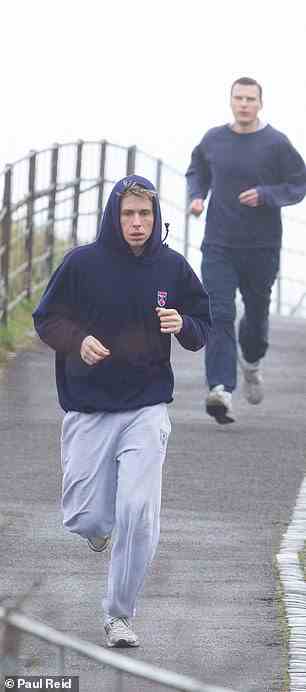 The scene seemed to show the young royal pondering some news while going for a jog with his bodyguard