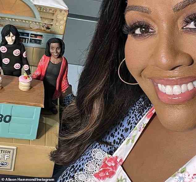 Seeing double: The presenter, who is pictured with her figurine, had originally been mooted as a potential replacement for Lucas, who announced he would be stepping down as host last year, in February