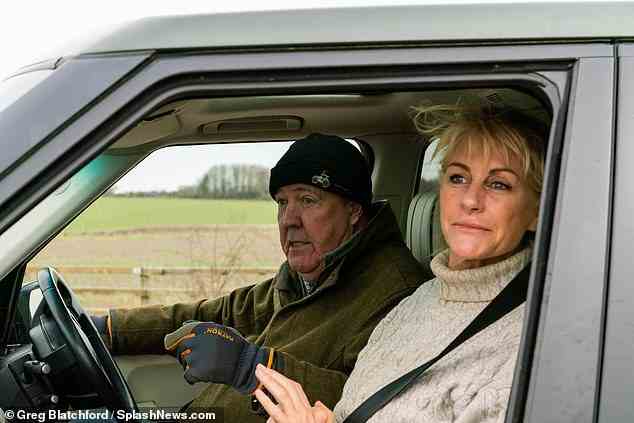 Jeremy Clarkson was seen being filmed by a camera crew on his Diddly Squat farm in Oxfordshire on Thursday. The former Top Gear star is pictured with partner Lisa Hogan