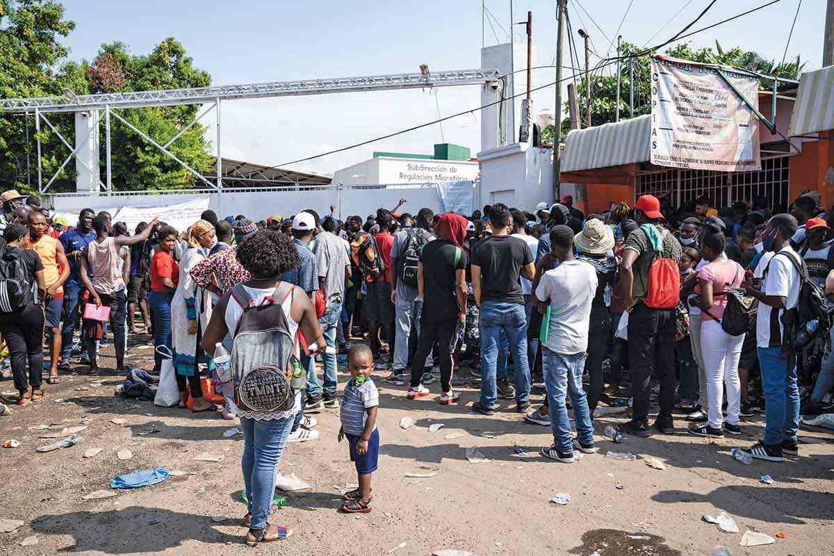 Migrants often stand for hours outside the offices of the Mexican Migration Authorities in Chiapas