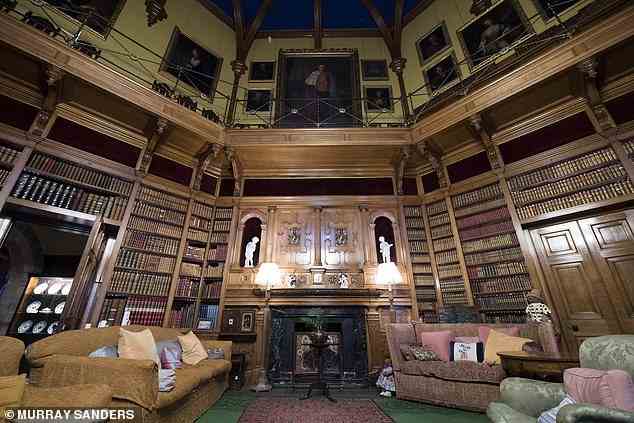 Ewan's primary goal is to generate the £2 million or so needed to keep this place solvent each year (Pictured: Library at Muncaster)