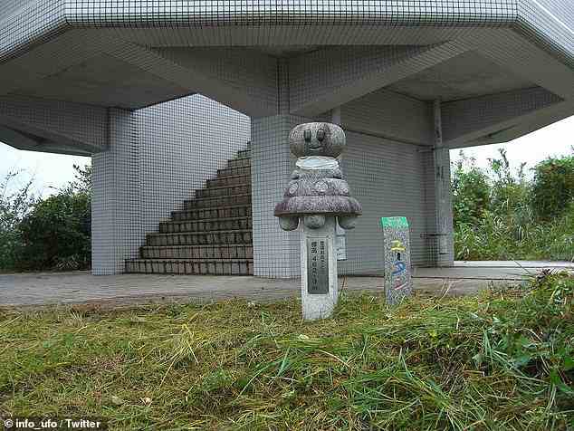 The village of Iino is decorated with alien-themed statues leading up the mountain