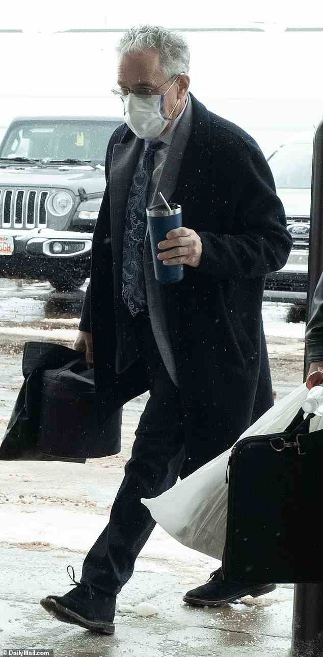 But Sanderson, pictured arriving at Park City District Court Monday wearing a face mask, claims Paltrow slammed into him while he was skiing leaving him with permanent injuries
