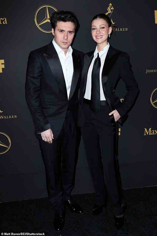 Beckhams in Black: Nicola Peltz, 28, und Brooklyn Beckham, 24, gaben am Freitagabend ein ziemlich adrettes Duo ab, als sie in klassischen schwarzen Anzügen an der Oscar-Party von Women in Film teilnahmen